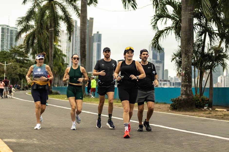 Groupe de coureurs s'entraînant ensemble en ville